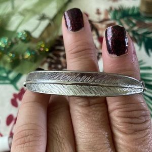 Lia sophia bracelet with feather design